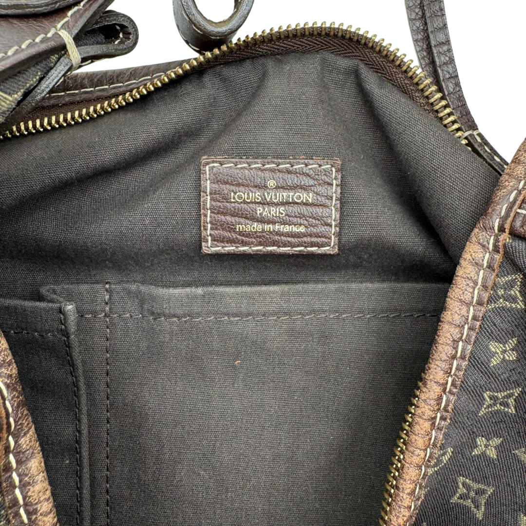 https://cdn.shopify.com/s/files/1/0564/9376/8855/files/Louis_Vuitton_Handtasche_Mini_Lin_Manon_MM_Hobo_monogram_braun_19.webp?v=1783516707