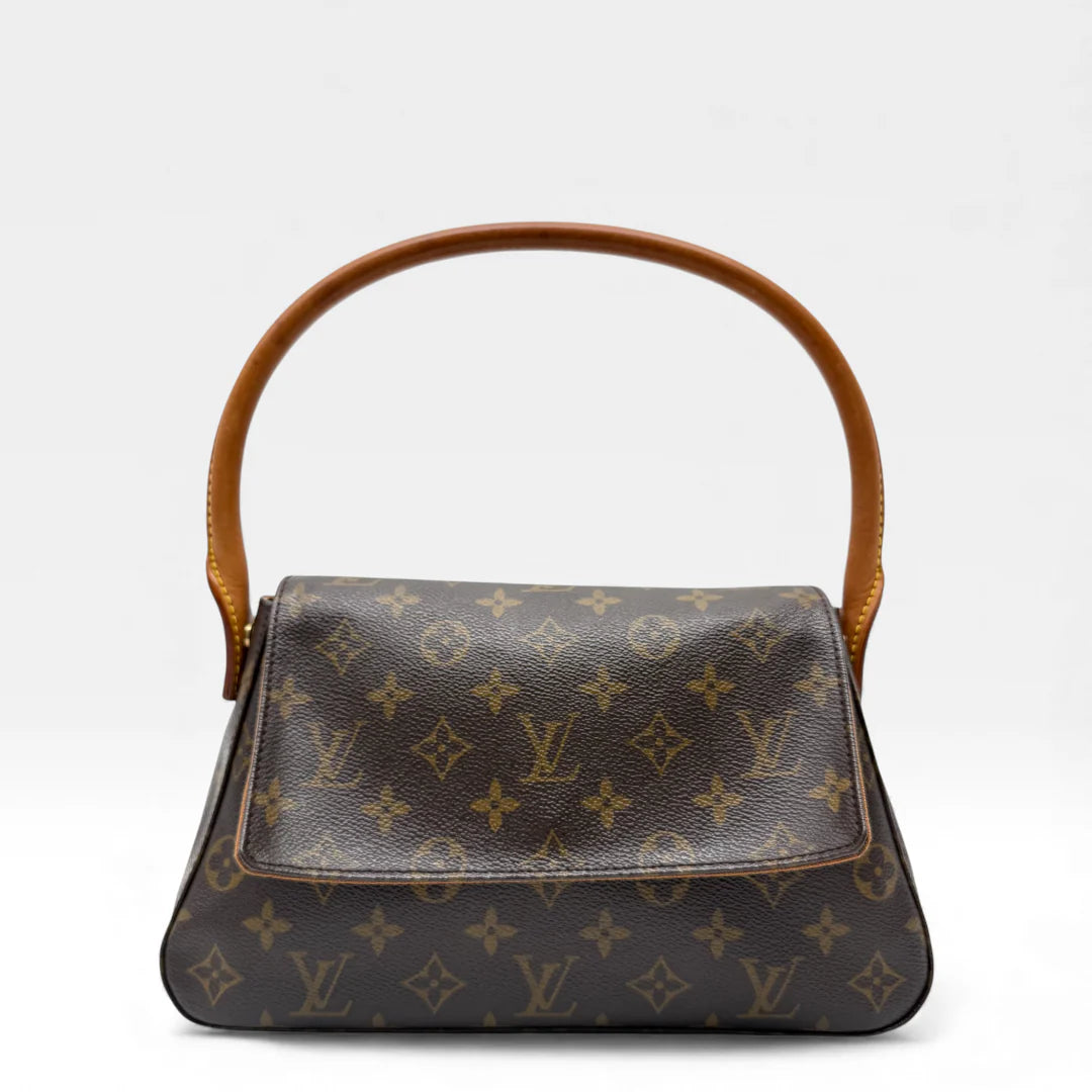 https://cdn.shopify.com/s/files/1/0564/9376/8855/files/Louis_Vuitton_Handtasche_Mini_Looping_monogram_braun_vintage_LV_handbag_5007.webp?v=1766066889