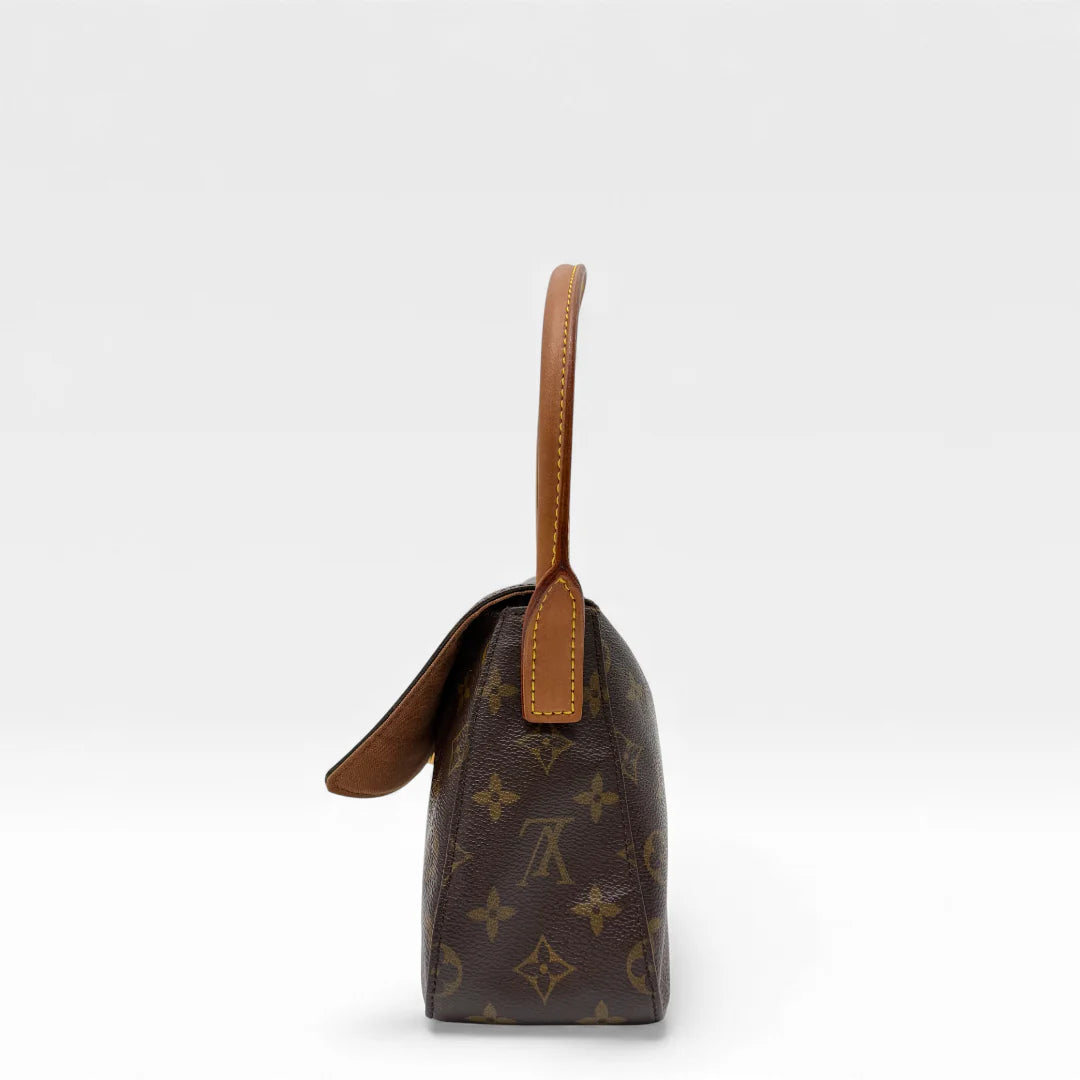 https://cdn.shopify.com/s/files/1/0564/9376/8855/files/Louis_Vuitton_Handtasche_Mini_Looping_monogram_braun_vintage_LV_handbag_5009.webp?v=1766066797