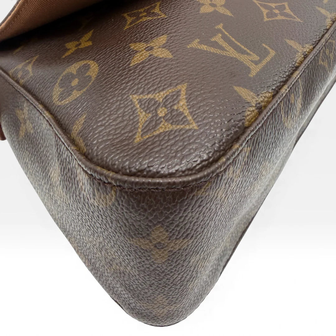 https://cdn.shopify.com/s/files/1/0564/9376/8855/files/Louis_Vuitton_Handtasche_Mini_Looping_monogram_braun_vintage_LV_handbag_5013.webp?v=1766066798