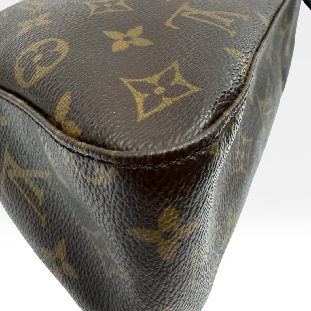 https://cdn.shopify.com/s/files/1/0564/9376/8855/files/Louis_Vuitton_Handtasche_Mini_Looping_monogram_braun_vintage_LV_handbag_5015.webp?v=1766066799