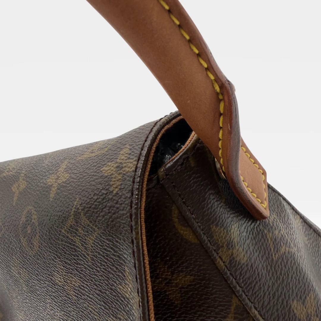 https://cdn.shopify.com/s/files/1/0564/9376/8855/files/Louis_Vuitton_Handtasche_Mini_Looping_monogram_braun_vintage_LV_handbag_5017.webp?v=1766066799