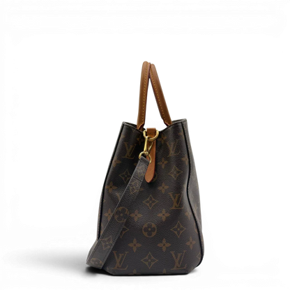 https://cdn.shopify.com/s/files/1/0564/9376/8855/files/Louis_Vuitton_Handtasche_Montaigne_mit_Schultergurt_monogram_braun_vintage_LV7826.webp?v=1780486935