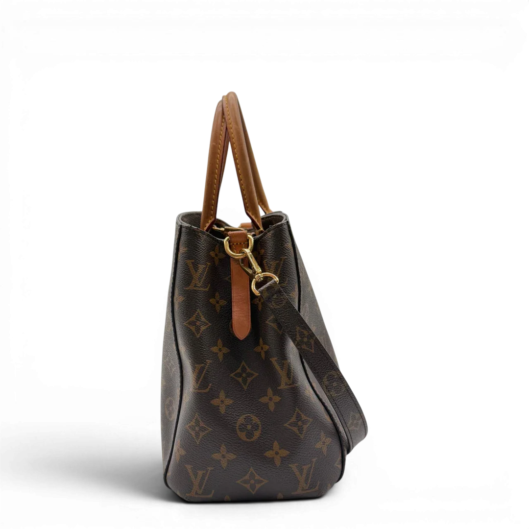 https://cdn.shopify.com/s/files/1/0564/9376/8855/files/Louis_Vuitton_Handtasche_Montaigne_mit_Schultergurt_monogram_braun_vintage_LV7827.webp?v=1780486935