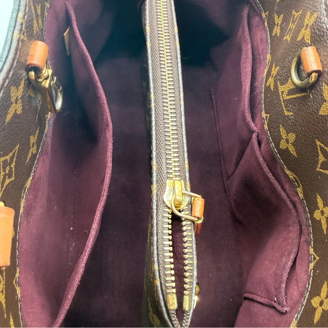 https://cdn.shopify.com/s/files/1/0564/9376/8855/files/Louis_Vuitton_Handtasche_Montaigne_mit_Schultergurt_monogram_braun_vintage_LV7839.webp?v=1780486936