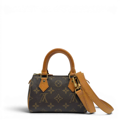 https://cdn.shopify.com/s/files/1/0564/9376/8855/files/Louis_Vuitton_Handtasche_Nano_Speedy_mit_Umhangegurt_monogram_braun_vintage_LV7667.webp?v=1779408304