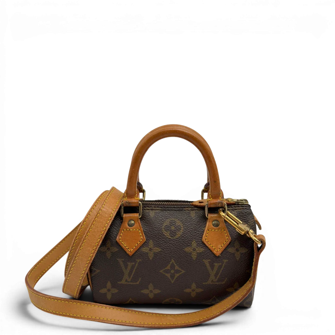 https://cdn.shopify.com/s/files/1/0564/9376/8855/files/Louis_Vuitton_Handtasche_Nano_Speedy_mit_Umhangegurt_monogram_braun_vintage_LV7669.webp?v=1779408304