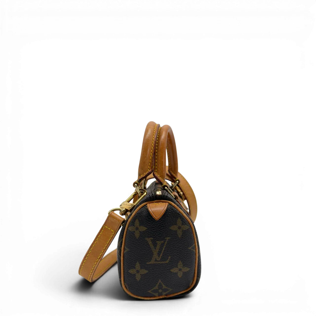 https://cdn.shopify.com/s/files/1/0564/9376/8855/files/Louis_Vuitton_Handtasche_Nano_Speedy_mit_Umhangegurt_monogram_braun_vintage_LV7671.webp?v=1779408304