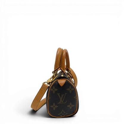 https://cdn.shopify.com/s/files/1/0564/9376/8855/files/Louis_Vuitton_Handtasche_Nano_Speedy_mit_Umhangegurt_monogram_braun_vintage_LV7671.webp?v=1779408304