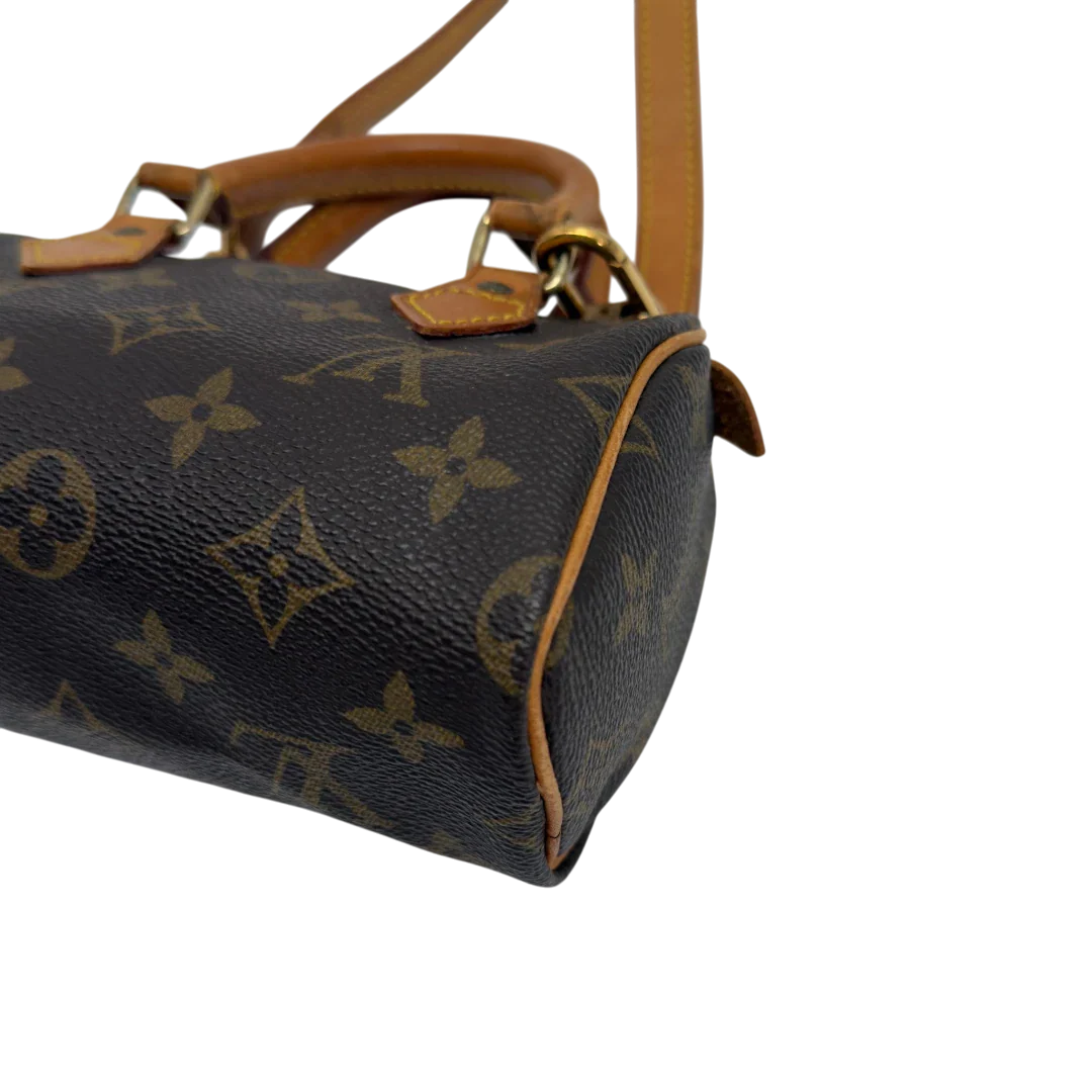 https://cdn.shopify.com/s/files/1/0564/9376/8855/files/Louis_Vuitton_Handtasche_Nano_Speedy_mit_Umhangegurt_monogram_braun_vintage_LV7673.webp?v=1779408304
