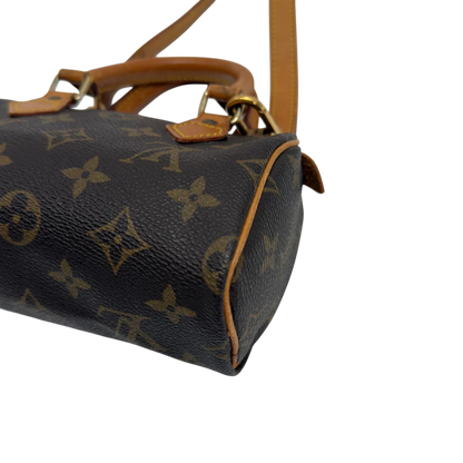 https://cdn.shopify.com/s/files/1/0564/9376/8855/files/Louis_Vuitton_Handtasche_Nano_Speedy_mit_Umhangegurt_monogram_braun_vintage_LV7673.webp?v=1779408304