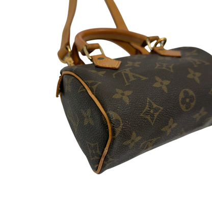 https://cdn.shopify.com/s/files/1/0564/9376/8855/files/Louis_Vuitton_Handtasche_Nano_Speedy_mit_Umhangegurt_monogram_braun_vintage_LV7674.webp?v=1779408304