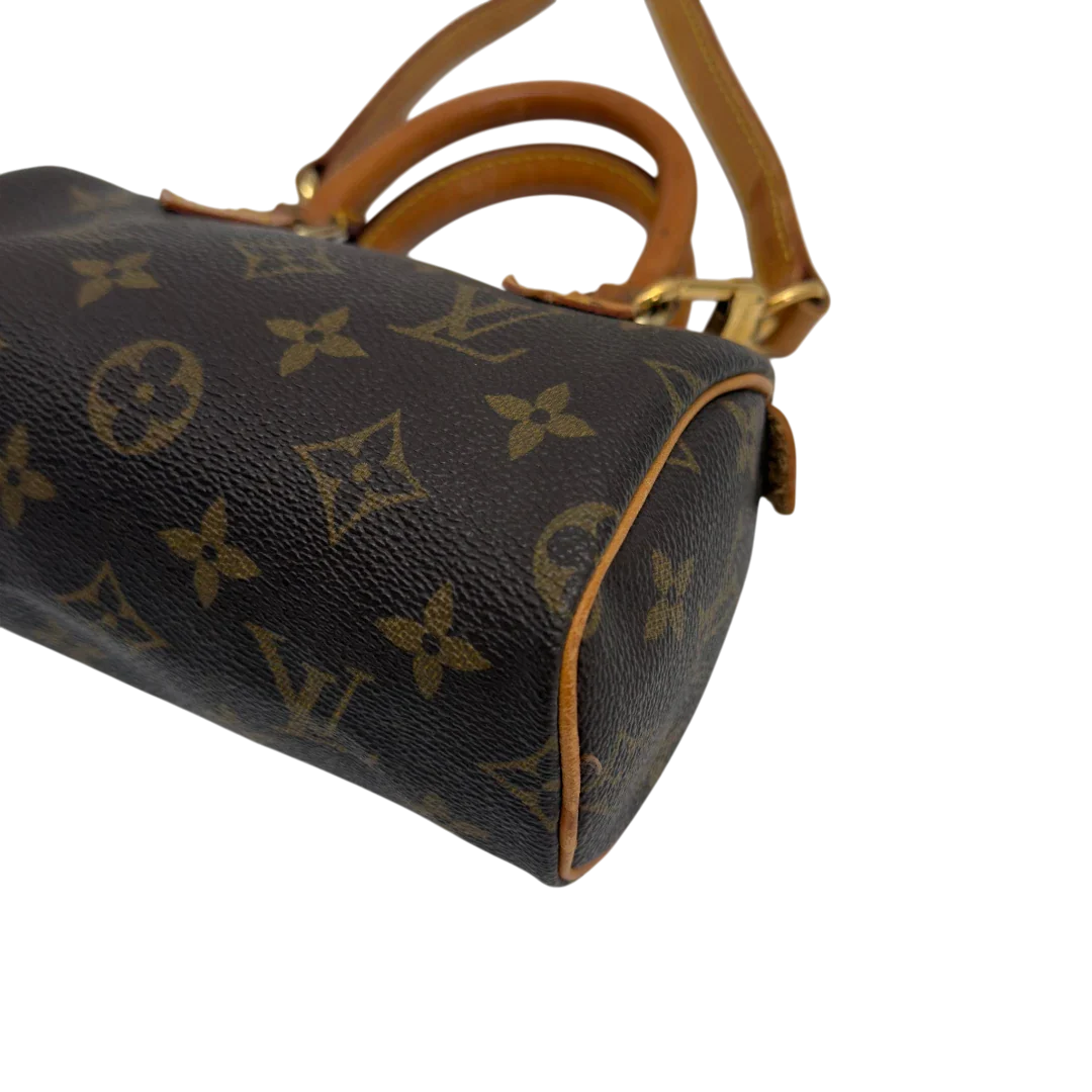 https://cdn.shopify.com/s/files/1/0564/9376/8855/files/Louis_Vuitton_Handtasche_Nano_Speedy_mit_Umhangegurt_monogram_braun_vintage_LV7675.webp?v=1779408304