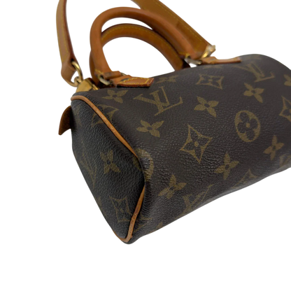 https://cdn.shopify.com/s/files/1/0564/9376/8855/files/Louis_Vuitton_Handtasche_Nano_Speedy_mit_Umhangegurt_monogram_braun_vintage_LV7676.webp?v=1779408304