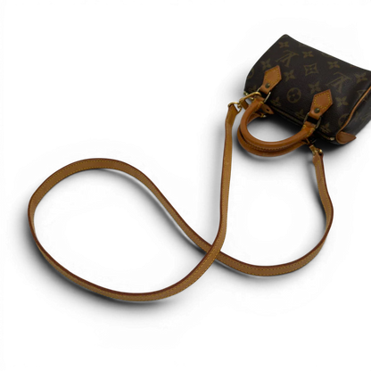 https://cdn.shopify.com/s/files/1/0564/9376/8855/files/Louis_Vuitton_Handtasche_Nano_Speedy_mit_Umhangegurt_monogram_braun_vintage_LV7677.webp?v=1779408304