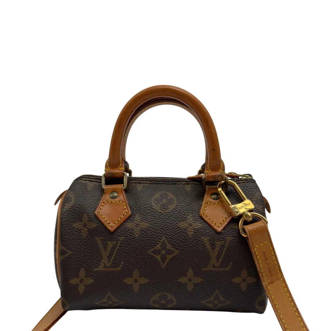 https://cdn.shopify.com/s/files/1/0564/9376/8855/files/Louis_Vuitton_Handtasche_Nano_Speedy_mit_Umhangegurt_monogram_braun_vintage_LV7678.webp?v=1779408304