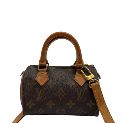 https://cdn.shopify.com/s/files/1/0564/9376/8855/files/Louis_Vuitton_Handtasche_Nano_Speedy_mit_Umhangegurt_monogram_braun_vintage_LV7678.webp?v=1779408304