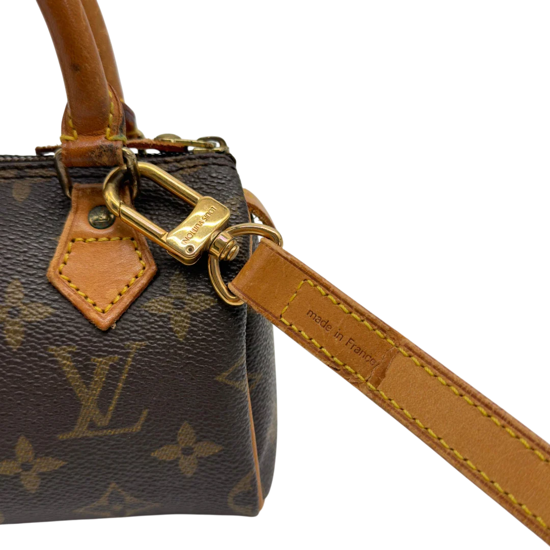https://cdn.shopify.com/s/files/1/0564/9376/8855/files/Louis_Vuitton_Handtasche_Nano_Speedy_mit_Umhangegurt_monogram_braun_vintage_LV7681.webp?v=1779408305