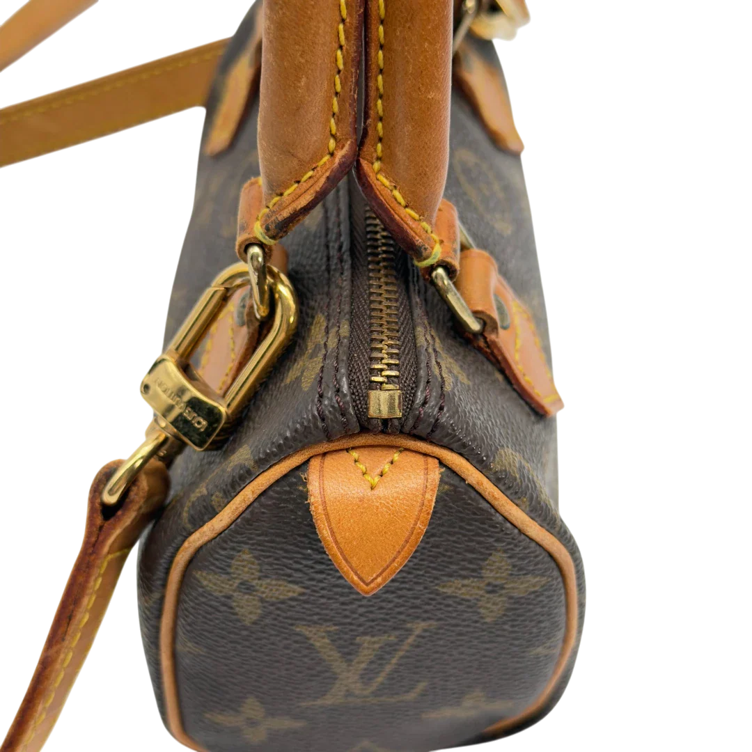 https://cdn.shopify.com/s/files/1/0564/9376/8855/files/Louis_Vuitton_Handtasche_Nano_Speedy_mit_Umhangegurt_monogram_braun_vintage_LV7683.webp?v=1779408304
