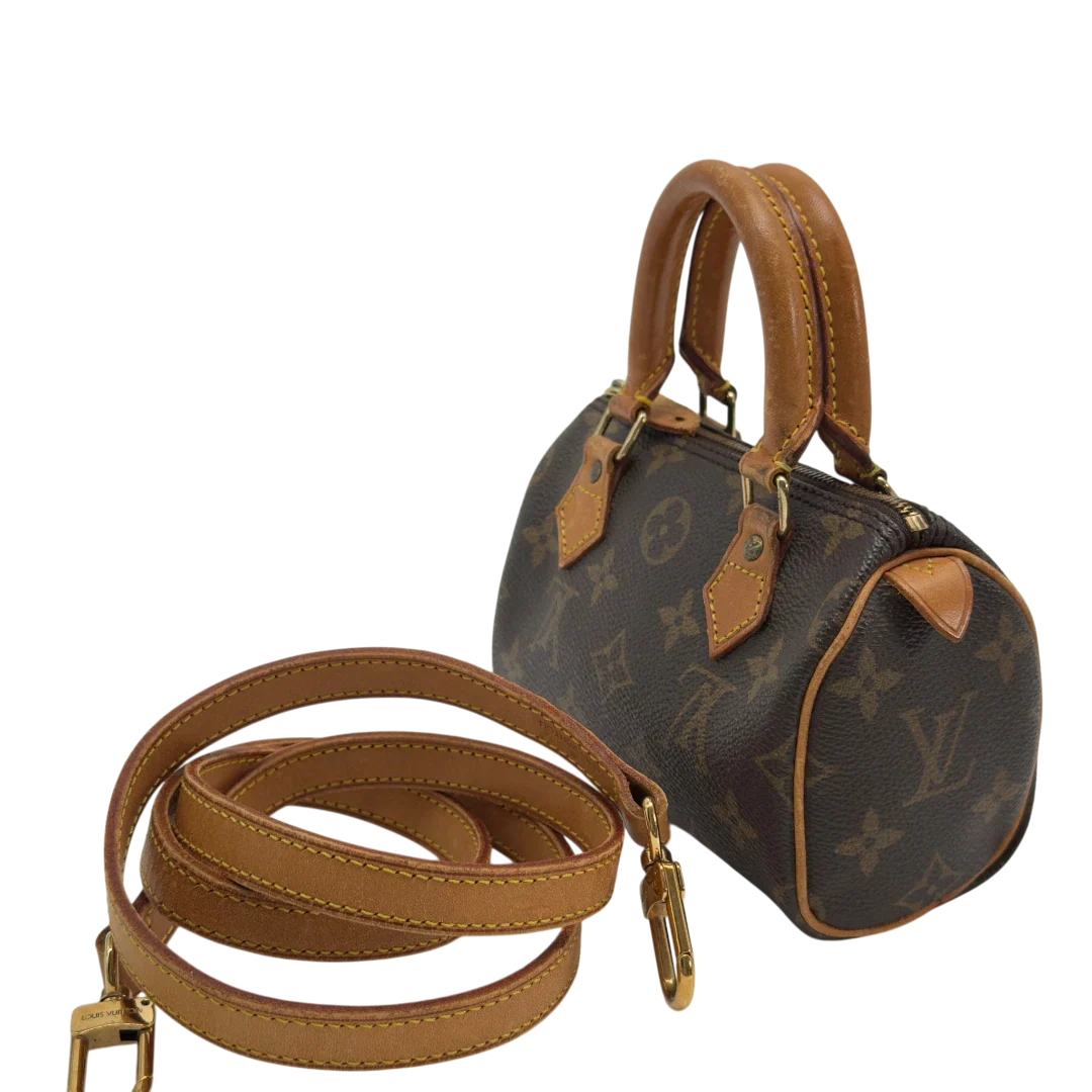 https://cdn.shopify.com/s/files/1/0564/9376/8855/files/Louis_Vuitton_Handtasche_Nano_Speedy_mit_Umhangegurt_monogram_braun_vintage_LV7685.webp?v=1779408304