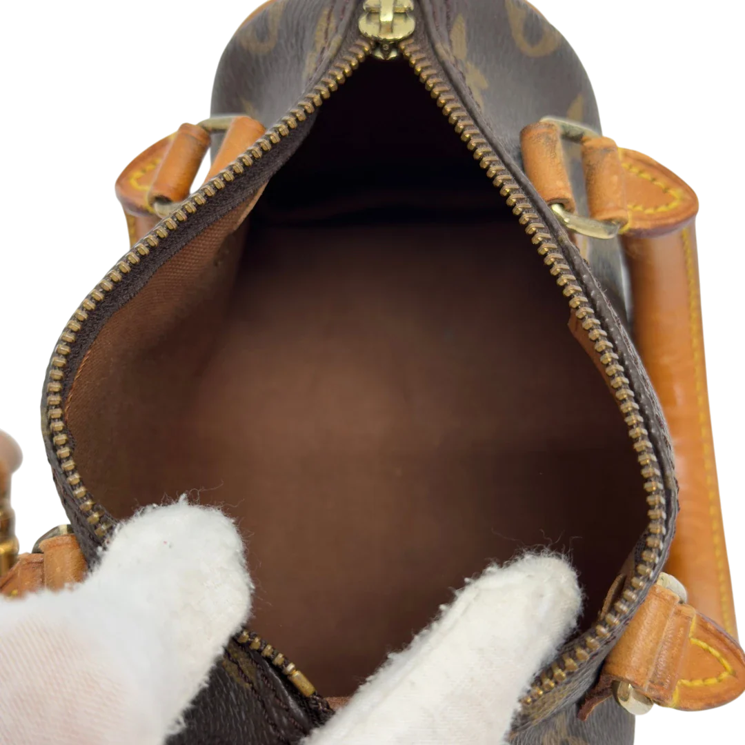 https://cdn.shopify.com/s/files/1/0564/9376/8855/files/Louis_Vuitton_Handtasche_Nano_Speedy_mit_Umhangegurt_monogram_braun_vintage_LV7687.webp?v=1779408304