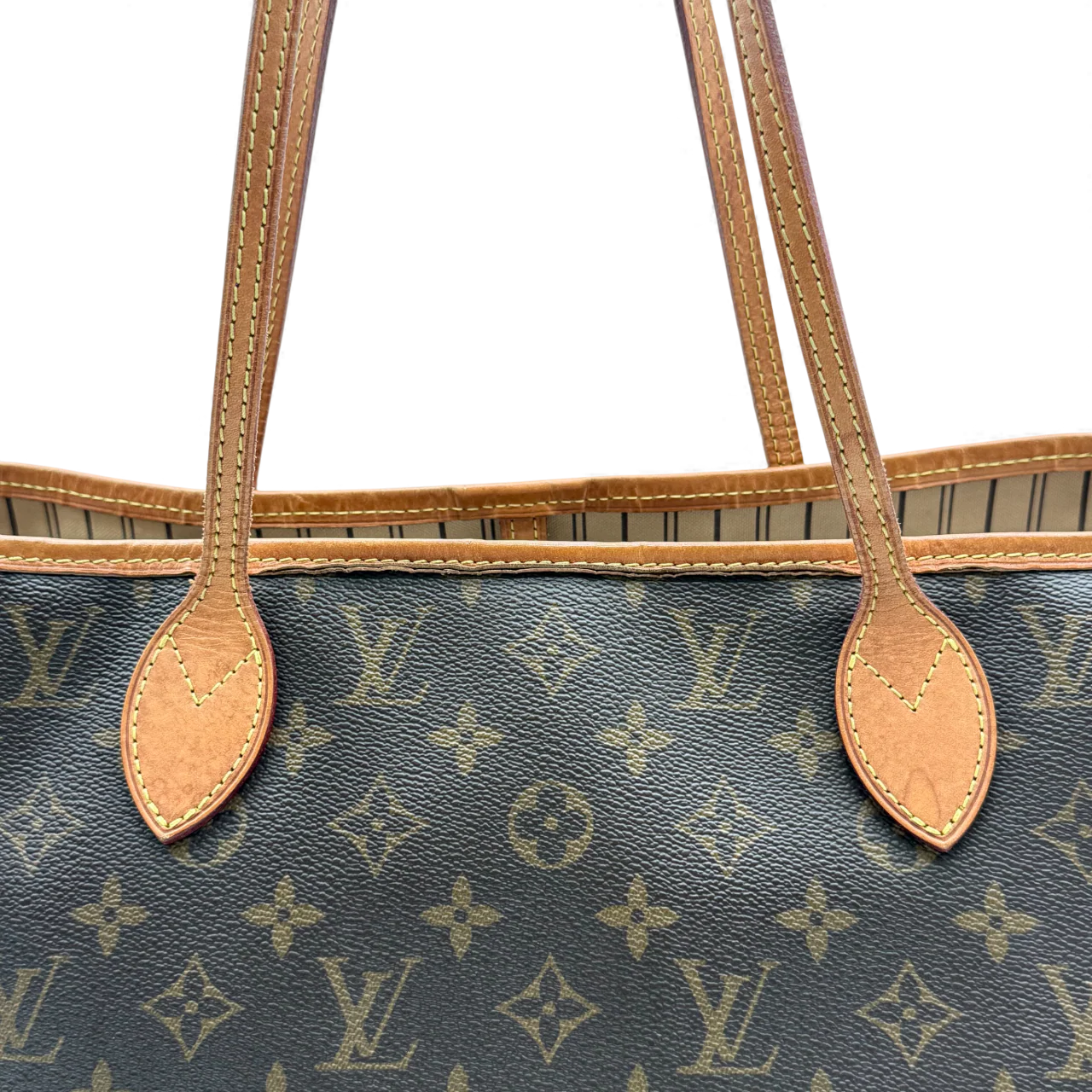 https://cdn.shopify.com/s/files/1/0564/9376/8855/files/Louis_Vuitton_Handtasche_Neverfull_GM_mit_Clutch_monogram_braun_vintage_LV_handbag4288.webp?v=1764853941