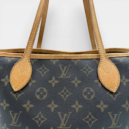 https://cdn.shopify.com/s/files/1/0564/9376/8855/files/Louis_Vuitton_Handtasche_Neverfull_PM_monogram_braun_vintage_LV_8040.webp?v=1768320583