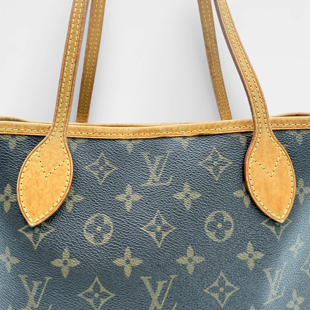 https://cdn.shopify.com/s/files/1/0564/9376/8855/files/Louis_Vuitton_Handtasche_Neverfull_PM_monogram_braun_vintage_LV_8041.webp?v=1768320583