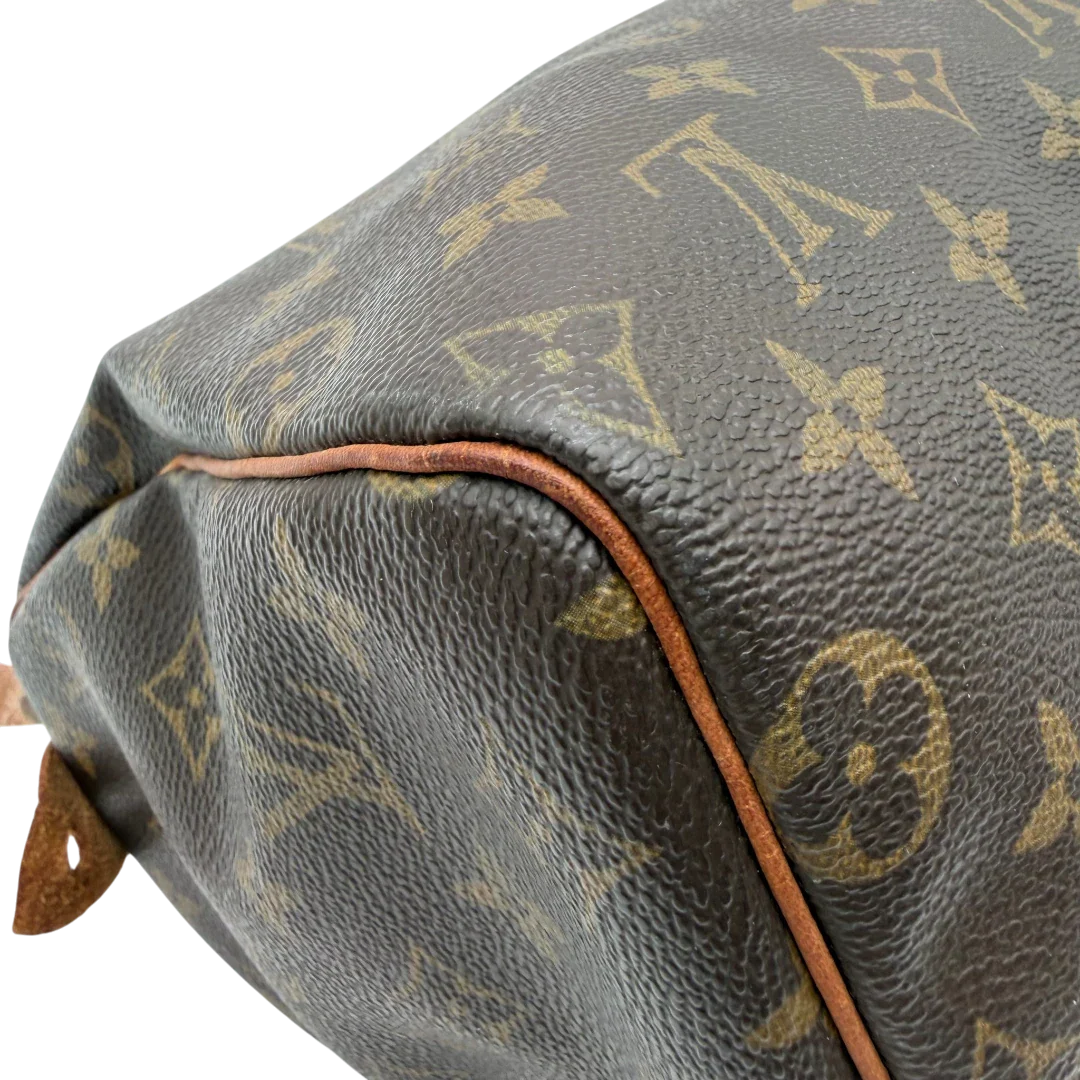https://cdn.shopify.com/s/files/1/0564/9376/8855/files/Louis_Vuitton_Handtasche_Speedy_25_monogram_braun_vintage_LV5904.webp?v=1778067576