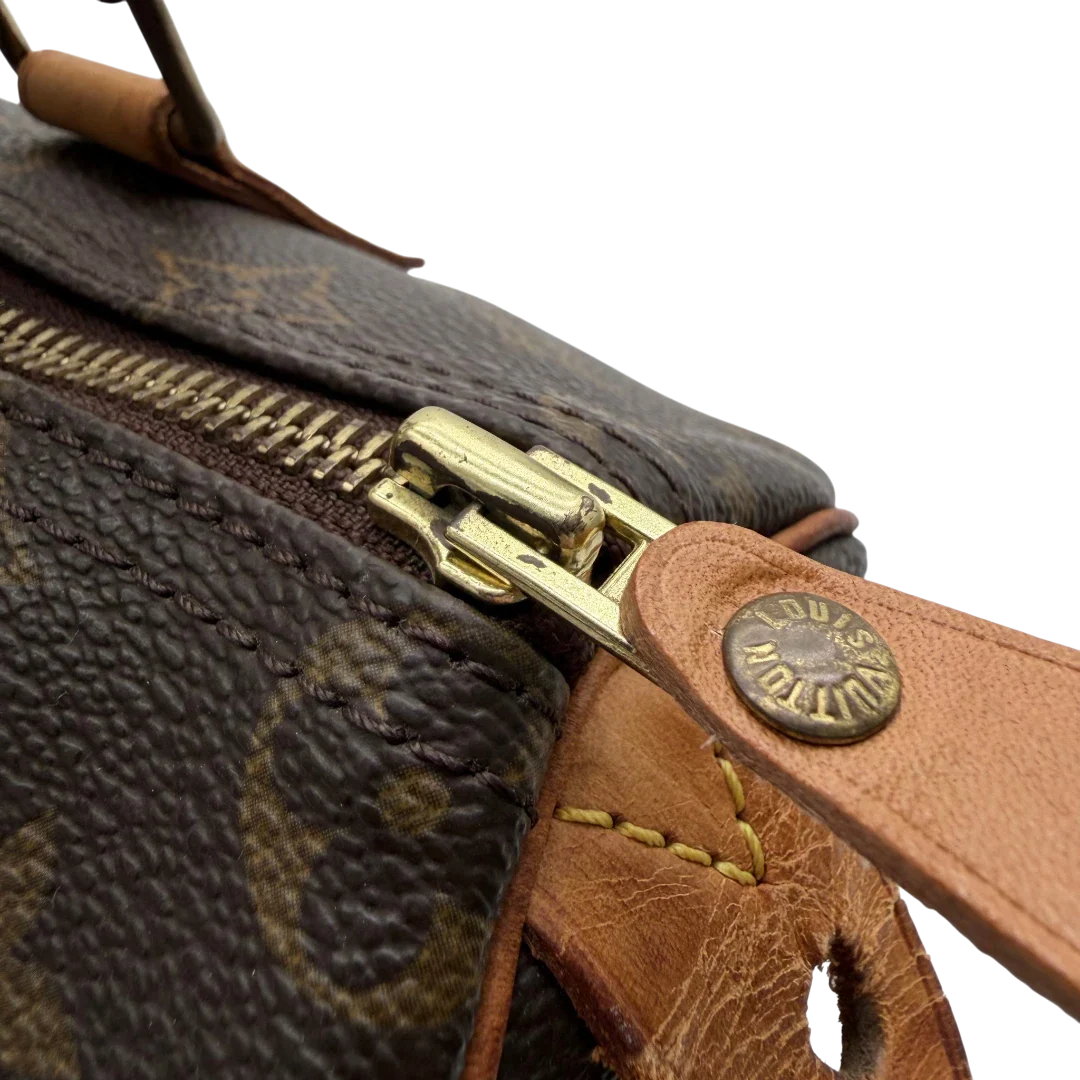 https://cdn.shopify.com/s/files/1/0564/9376/8855/files/Louis_Vuitton_Handtasche_Speedy_25_monogram_braun_vintage_LV5907.webp?v=1778067575