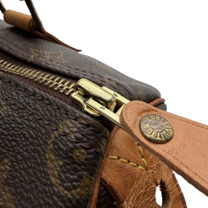 https://cdn.shopify.com/s/files/1/0564/9376/8855/files/Louis_Vuitton_Handtasche_Speedy_25_monogram_braun_vintage_LV5907.webp?v=1778067575