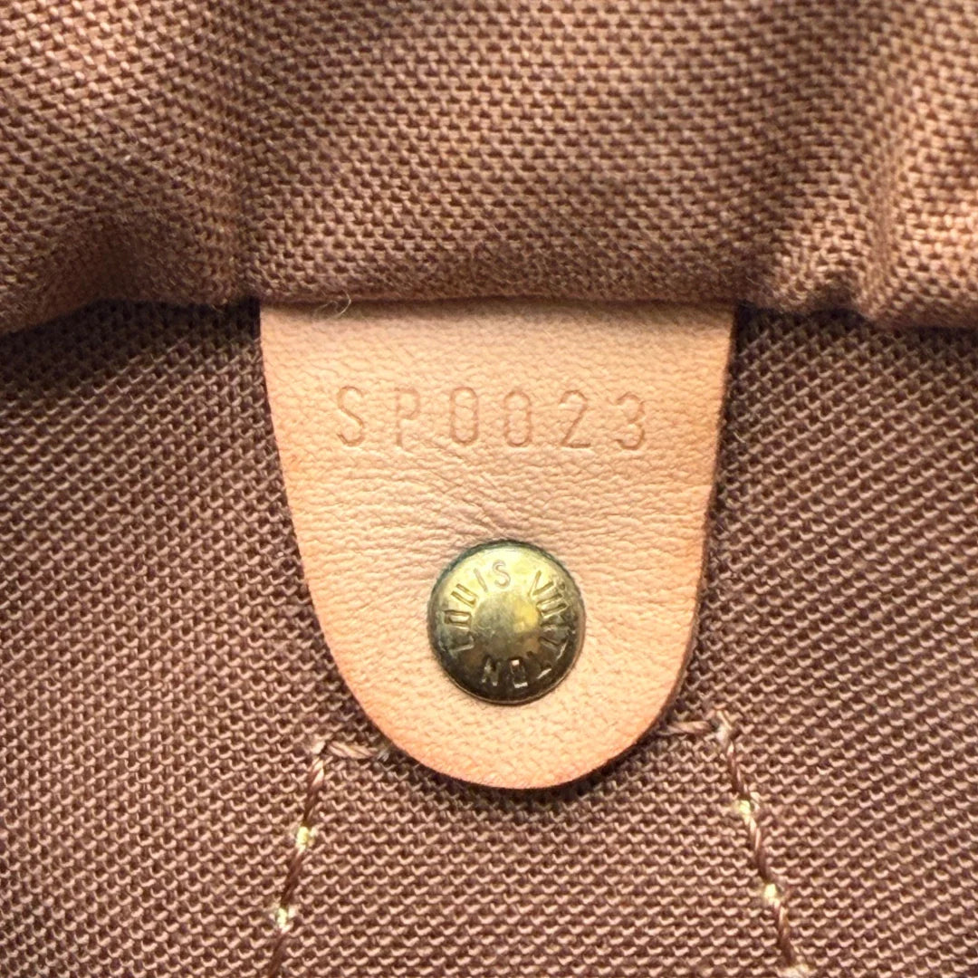 https://cdn.shopify.com/s/files/1/0564/9376/8855/files/Louis_Vuitton_Handtasche_Speedy_25_monogram_braun_vintage_LV5912.webp?v=1778067576