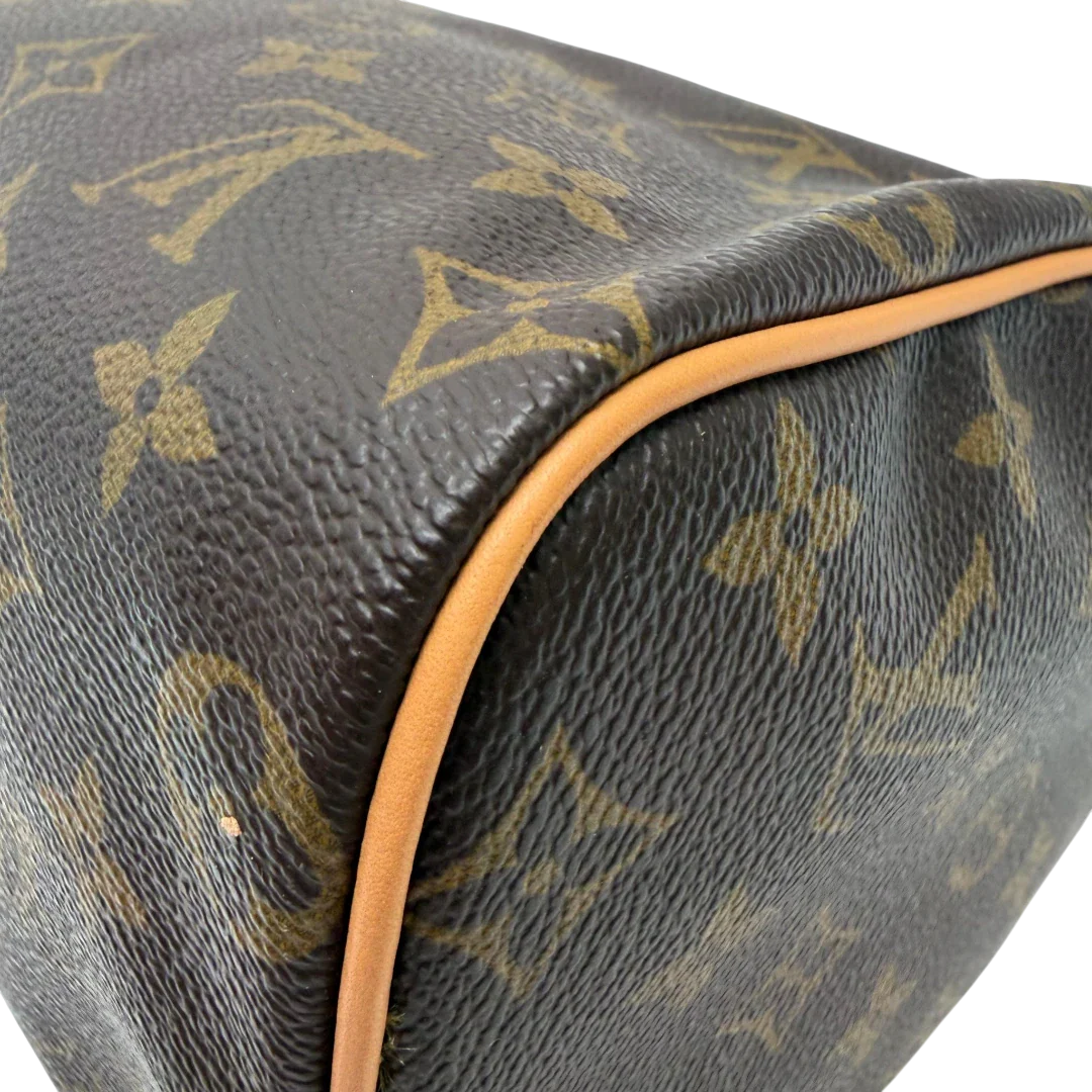 https://cdn.shopify.com/s/files/1/0564/9376/8855/files/Louis_Vuitton_Handtasche_Speedy_25_monogram_braun_vintage_LV7699.webp?v=1780487970