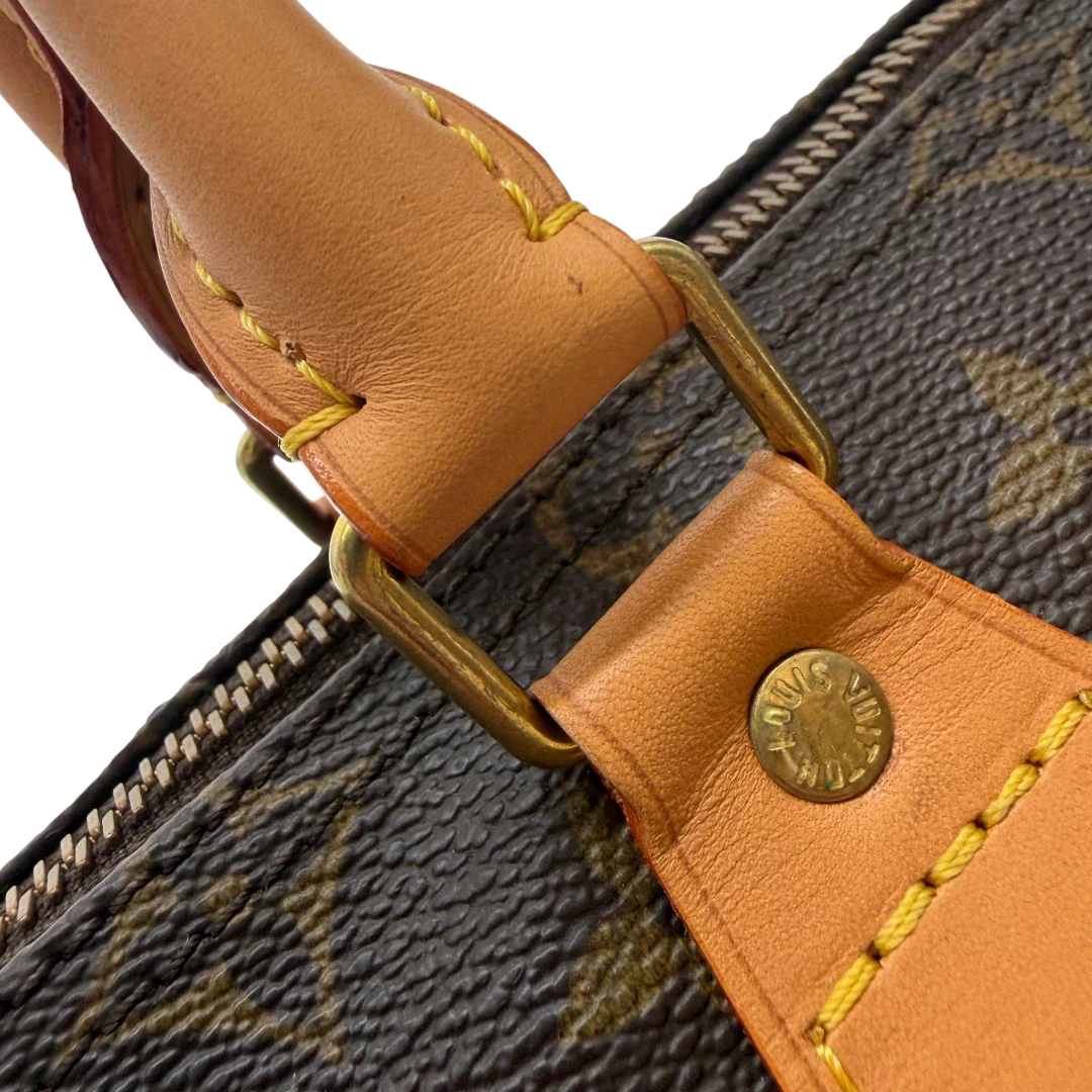 https://cdn.shopify.com/s/files/1/0564/9376/8855/files/Louis_Vuitton_Handtasche_Speedy_25_monogram_braun_vintage_LV7702.webp?v=1780487970