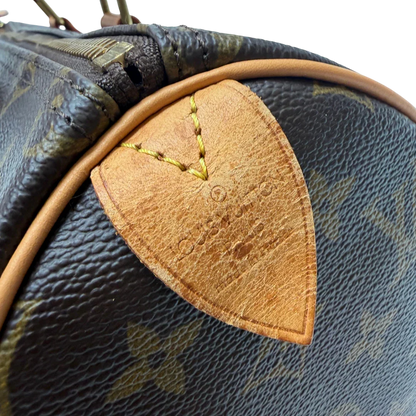 https://cdn.shopify.com/s/files/1/0564/9376/8855/files/Louis_Vuitton_Handtasche_Speedy_25_monogram_braun_vintage_LV7703.webp?v=1780487970