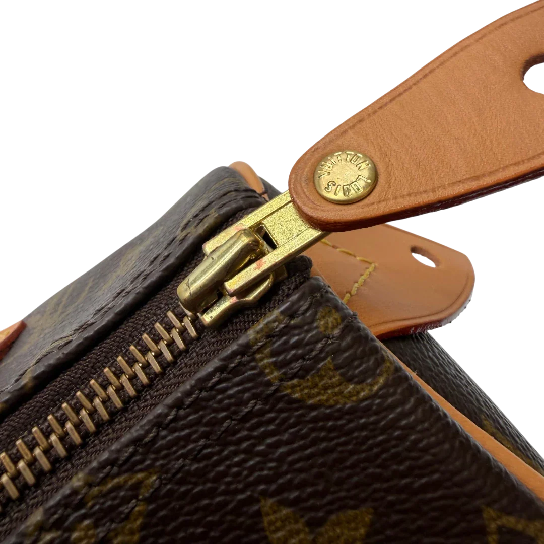 https://cdn.shopify.com/s/files/1/0564/9376/8855/files/Louis_Vuitton_Handtasche_Speedy_25_monogram_braun_vintage_LV7704.webp?v=1780487969