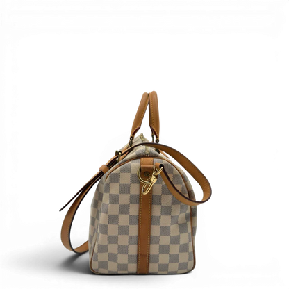 https://cdn.shopify.com/s/files/1/0564/9376/8855/files/Louis_Vuitton_Handtasche_Speedy_30_Bandouliere_Damier_Azur_weiss_4.webp?v=1784128191