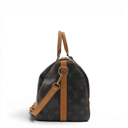 https://cdn.shopify.com/s/files/1/0564/9376/8855/files/Louis_Vuitton_Handtasche_Speedy_30_Bandouliere_monogram_braun_vintage_LV7464.webp?v=1779894866