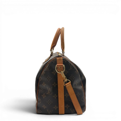 https://cdn.shopify.com/s/files/1/0564/9376/8855/files/Louis_Vuitton_Handtasche_Speedy_30_Bandouliere_monogram_braun_vintage_LV7465.webp?v=1779894866
