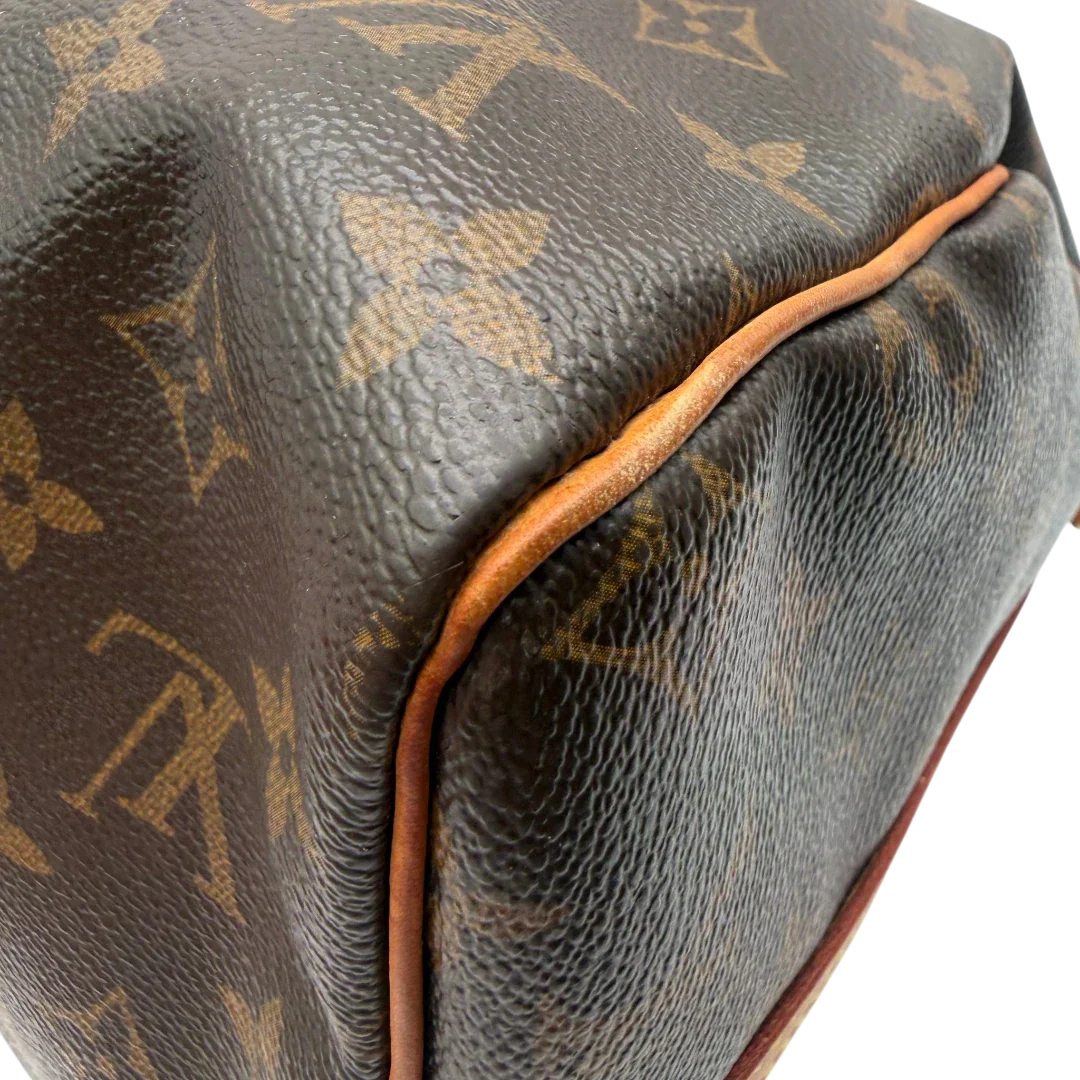 https://cdn.shopify.com/s/files/1/0564/9376/8855/files/Louis_Vuitton_Handtasche_Speedy_30_Bandouliere_monogram_braun_vintage_LV7467.webp?v=1779894866