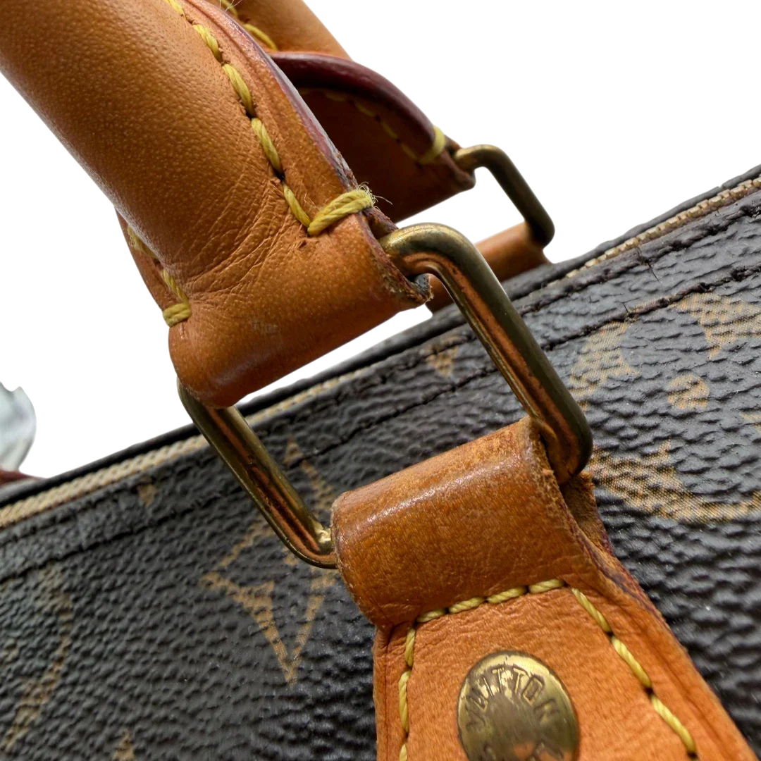https://cdn.shopify.com/s/files/1/0564/9376/8855/files/Louis_Vuitton_Handtasche_Speedy_30_Bandouliere_monogram_braun_vintage_LV8334.webp?v=1781052727