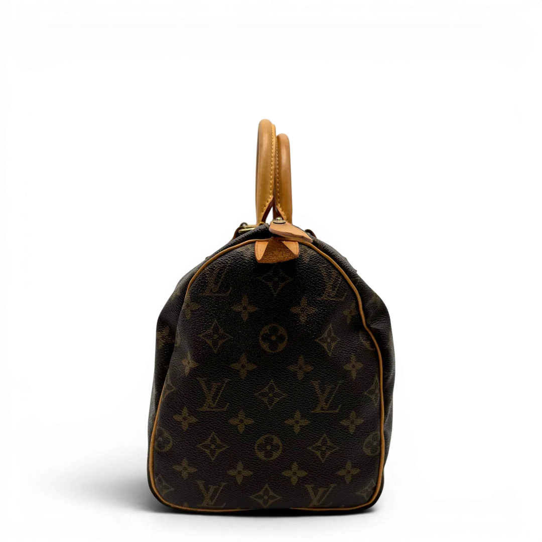 https://cdn.shopify.com/s/files/1/0564/9376/8855/files/Louis_Vuitton_Handtasche_Speedy_30_monogram_braun_vintage_LV2046.webp?v=1779963741