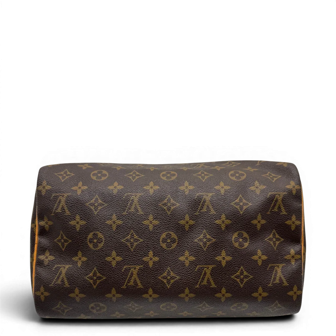https://cdn.shopify.com/s/files/1/0564/9376/8855/files/Louis_Vuitton_Handtasche_Speedy_30_monogram_braun_vintage_LV2048.webp?v=1779963741