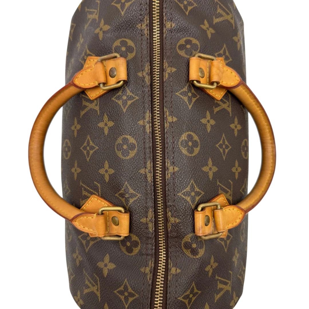 https://cdn.shopify.com/s/files/1/0564/9376/8855/files/Louis_Vuitton_Handtasche_Speedy_30_monogram_braun_vintage_LV2058.webp?v=1779963742
