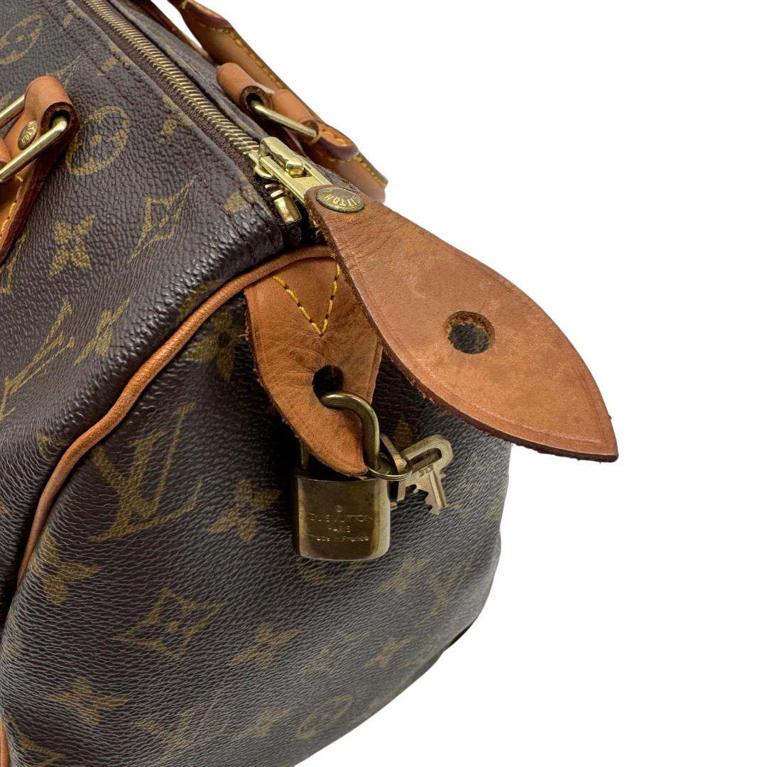 https://cdn.shopify.com/s/files/1/0564/9376/8855/files/Louis_Vuitton_Handtasche_Speedy_30_monogram_braun_vintage_LV2116.webp?v=1779963630