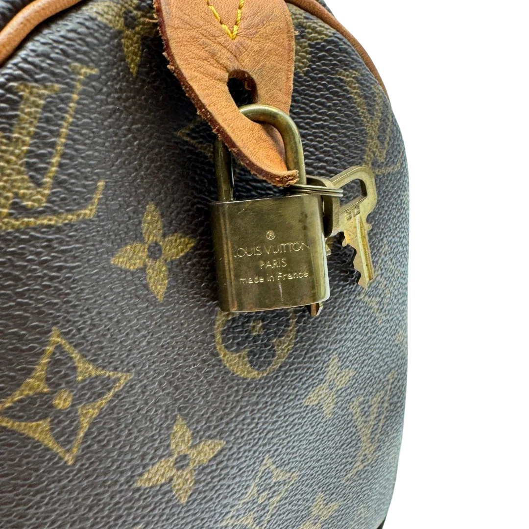 https://cdn.shopify.com/s/files/1/0564/9376/8855/files/Louis_Vuitton_Handtasche_Speedy_30_monogram_braun_vintage_LV2117.webp?v=1779963630