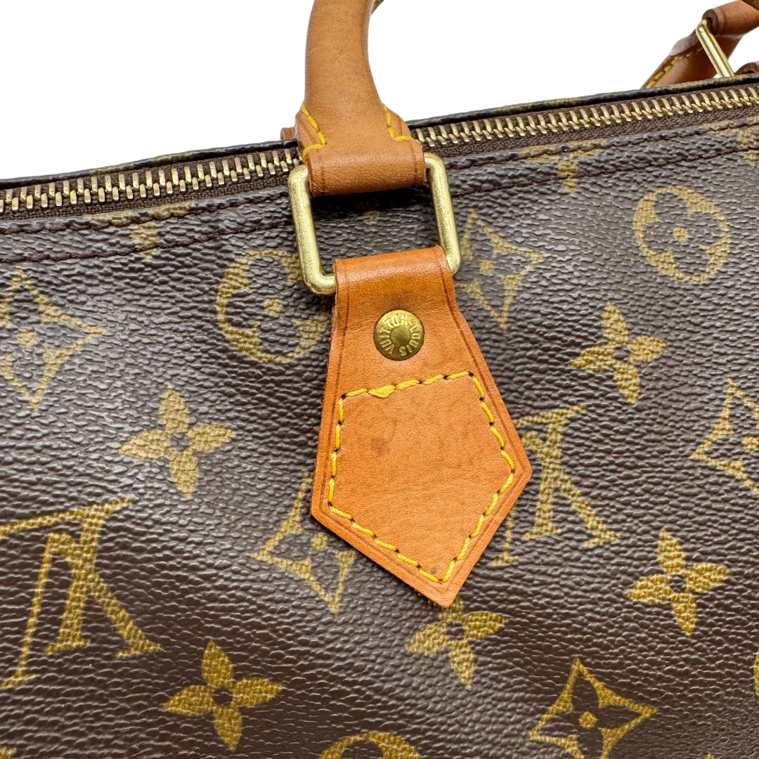 https://cdn.shopify.com/s/files/1/0564/9376/8855/files/Louis_Vuitton_Handtasche_Speedy_30_monogram_braun_vintage_LV2120.webp?v=1779963631