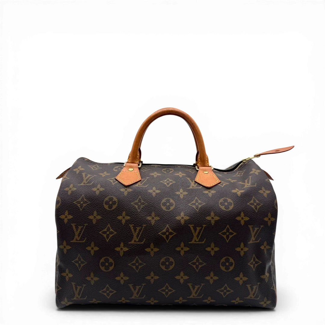 https://cdn.shopify.com/s/files/1/0564/9376/8855/files/Louis_Vuitton_Handtasche_Speedy_30_monogram_braun_vintage_LV4338.webp?v=1776345026