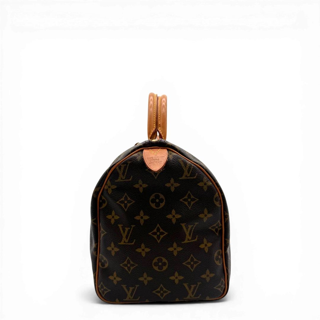 https://cdn.shopify.com/s/files/1/0564/9376/8855/files/Louis_Vuitton_Handtasche_Speedy_30_monogram_braun_vintage_LV4340.webp?v=1776345115