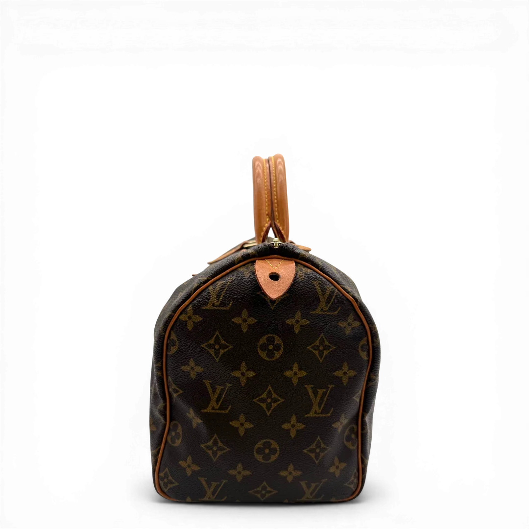 https://cdn.shopify.com/s/files/1/0564/9376/8855/files/Louis_Vuitton_Handtasche_Speedy_30_monogram_braun_vintage_LV4341.webp?v=1776345115